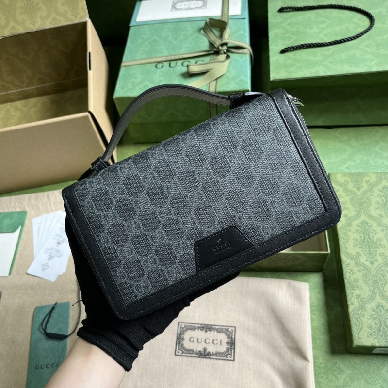 G*u*i clutch bags